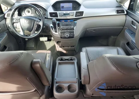 2011 Honda Odyssey Touring z USA, uszkodzony, nr VIN 5FNRL5H92BB079917